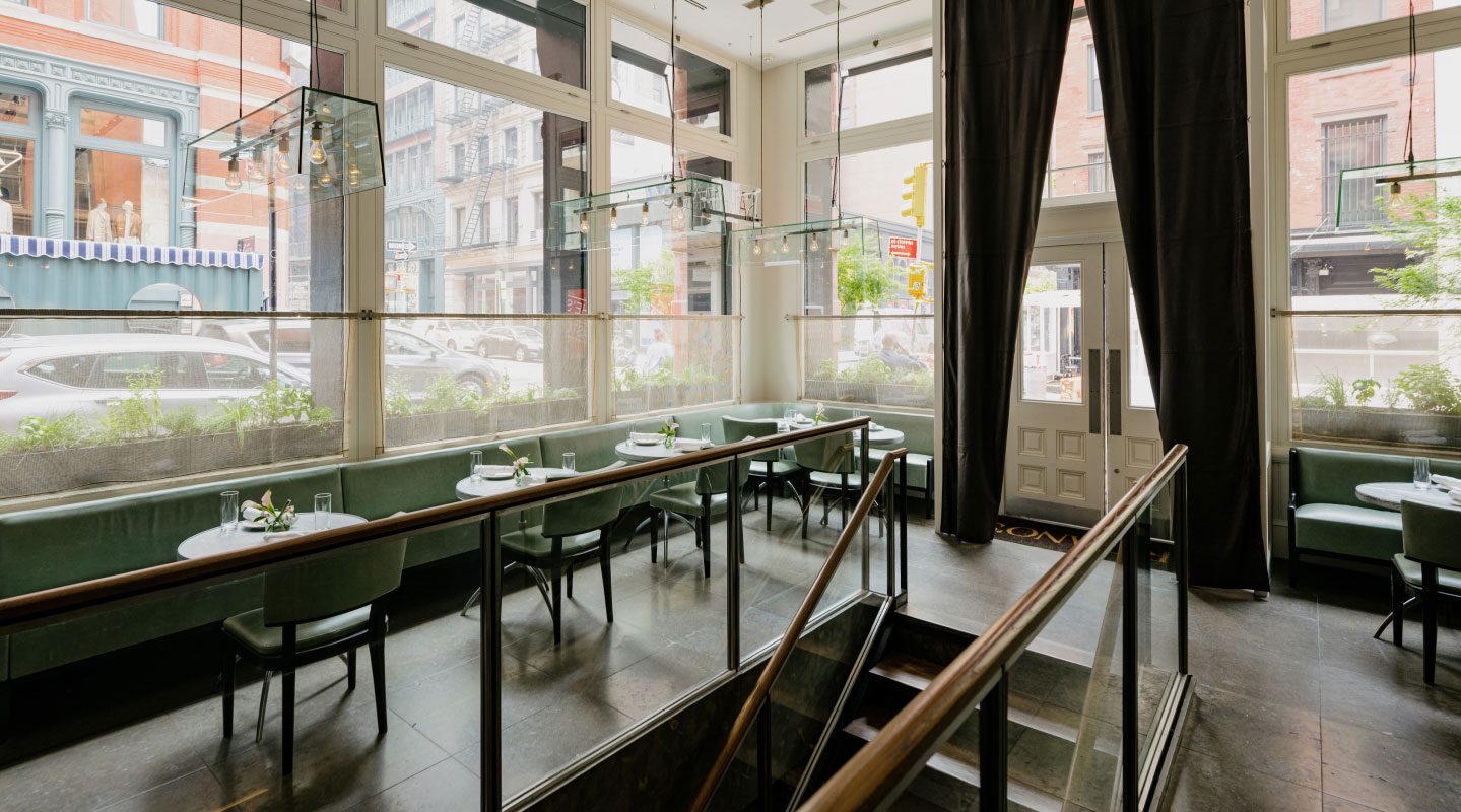 Sartiano's Street Level Dining Area with large windows and natural light